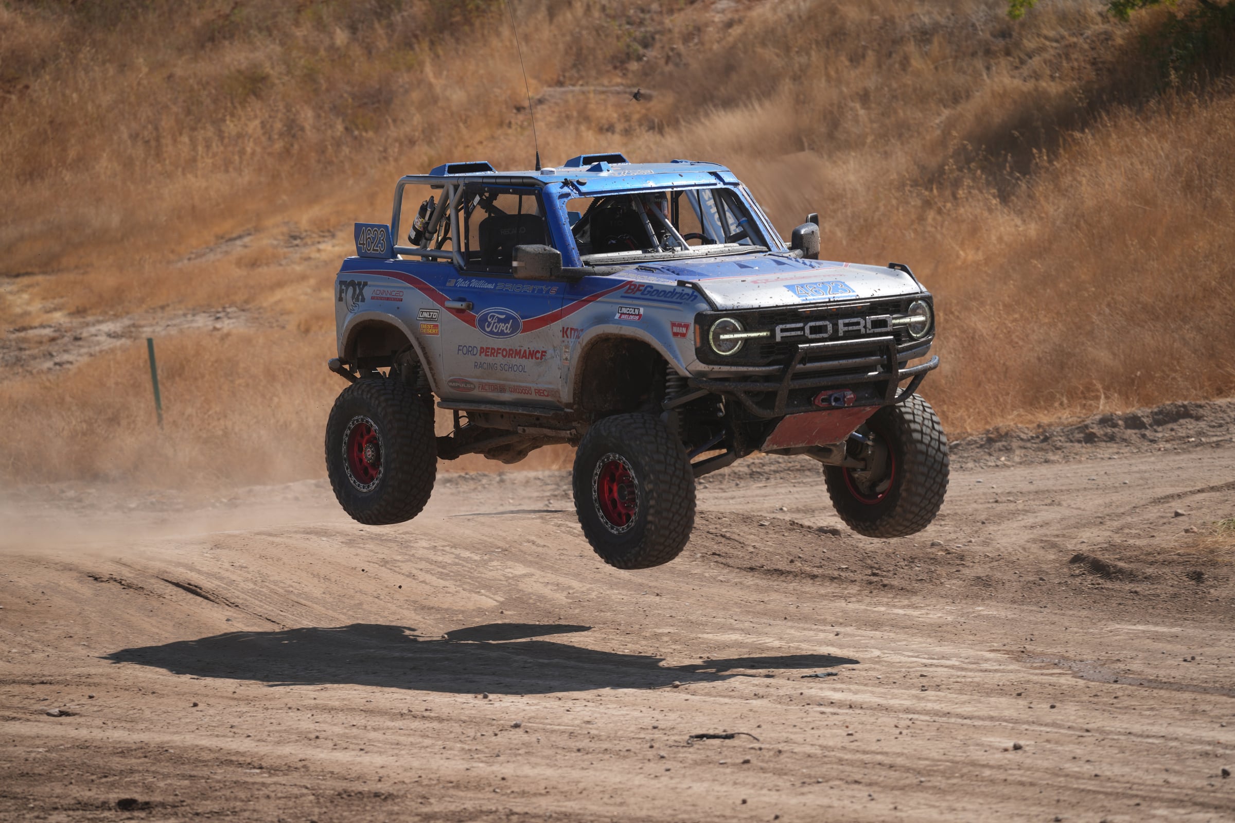 Ford Bronco catching air on the dirt at Prairie City